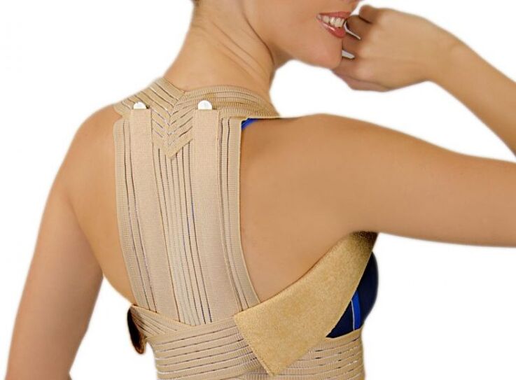 Yi akwa corset nwere ike ibelata ibu dị n'ọkpụkpụ azụ nke osteochondrosis na-emetụta